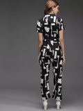 Darzi Women's Crepe Printed Jumpsuit Roposo Clout